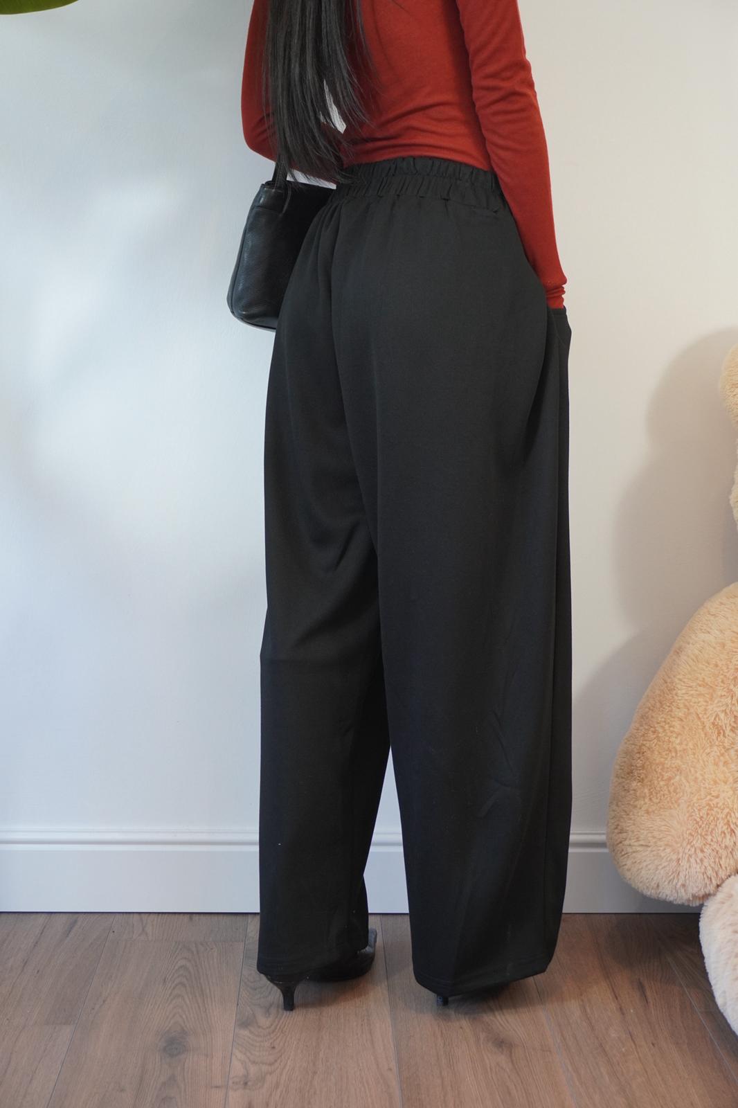 PANTALONE NERO CON BOTTONE 53118 NEW